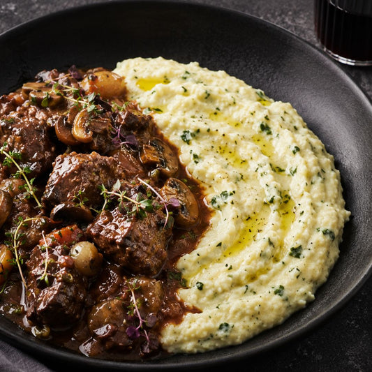 beef bourguignon with soft mascarpone and parmesan polenta