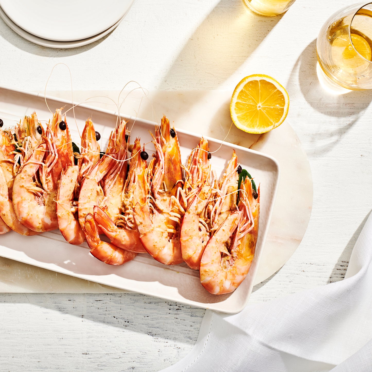 1 KG COOKED KING PRAWNS.