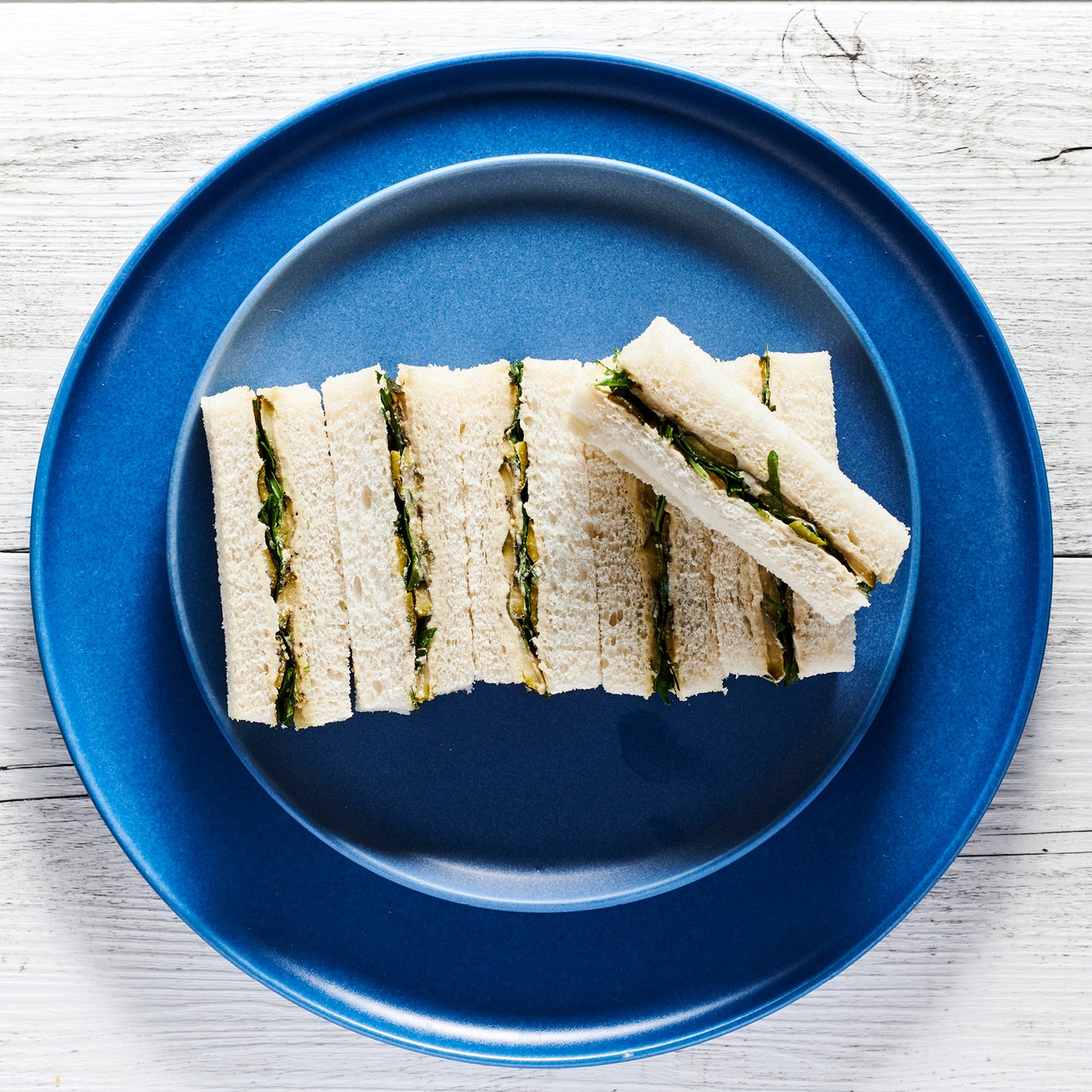 SUNDRIED TOMATO, GOATS CHEESE, HONEY, SPINACH, AVOCADO & PESTO FINGER SANDWICHES (12)
