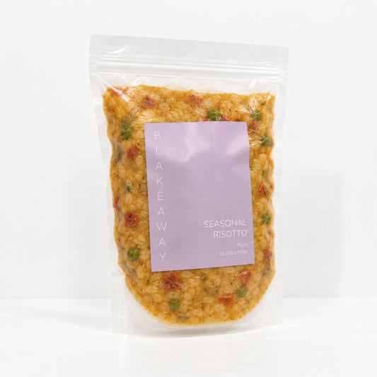 A clear stand-up pouch containing a cooked rice dish with visible vegetables, featuring a lavender label that reads 'BLAKEWAY' and 'SEASONAL RISOTTO'.