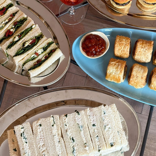 SUNDRIED TOMATO, GOATS CHEESE, HONEY, SPINACH, GUACAMOLE & PESTO FINGER SANDWICHES