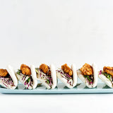 POPCORN CHICKEN BAO, CHIPOTLE MAYO, CABBAGE SLAW, PICKLED CUCUMBER (30)