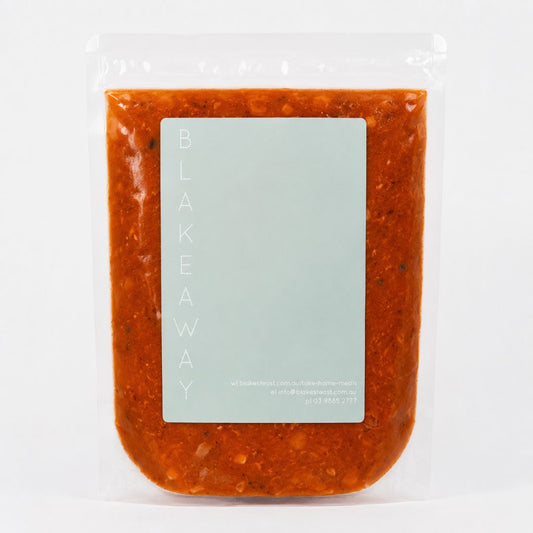 A clear plastic stand-up pouch containing a chunky orange-red minestrone soup, with a large pale mint-green label on the front that reads 'BLAKEWAY' vertically.
