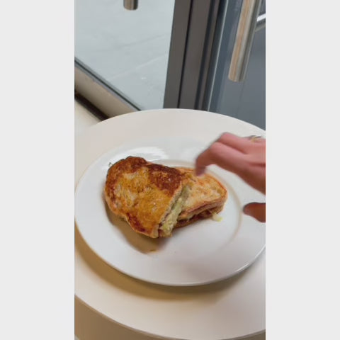 croque monsieur toasted sandwich dipped in chicken noodle soup