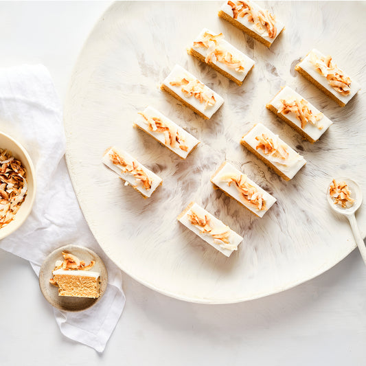 10 lemon slices arranged on a platter